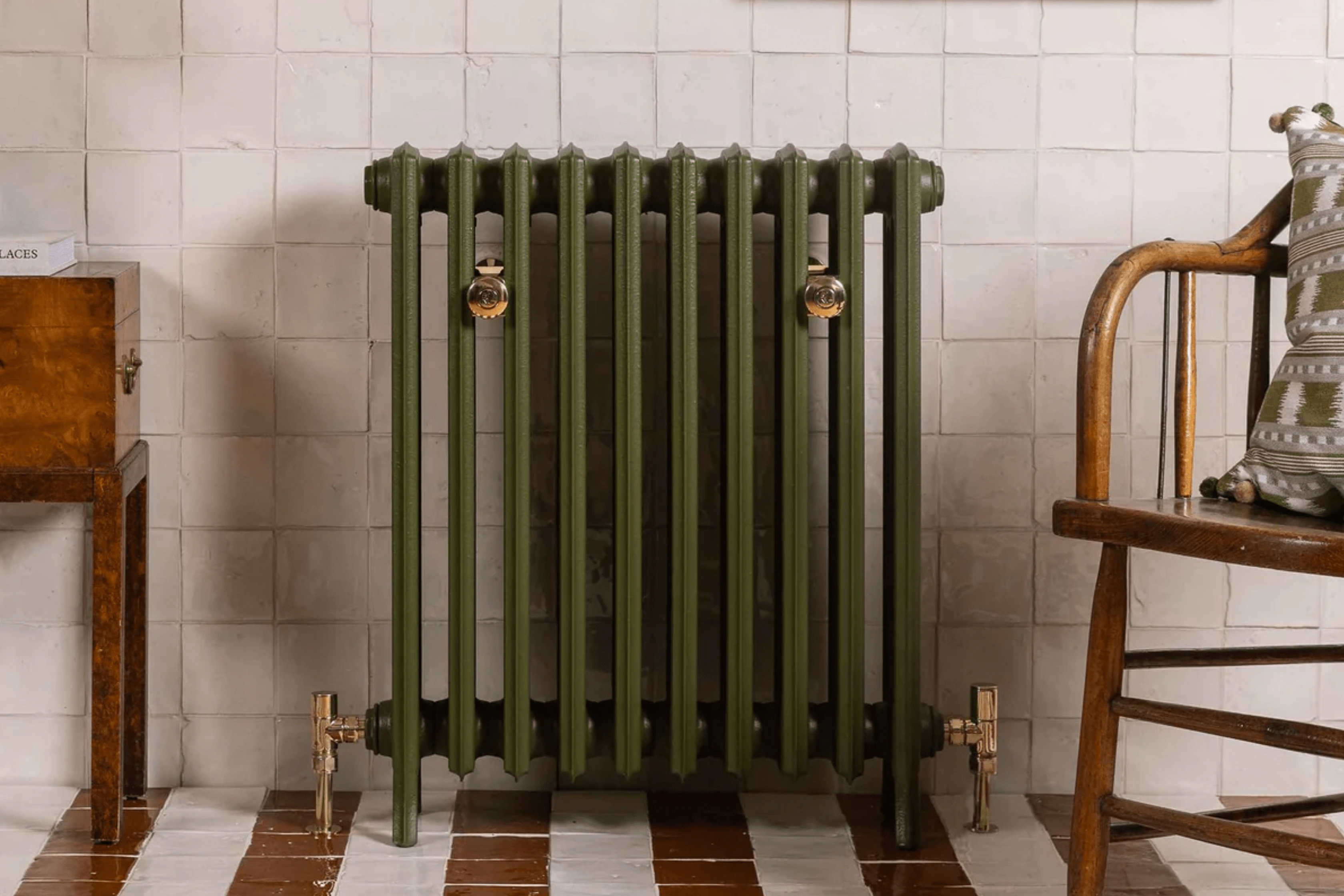 Retro Dark Olive Green Traditional Radiator In A Commercial Bathroom